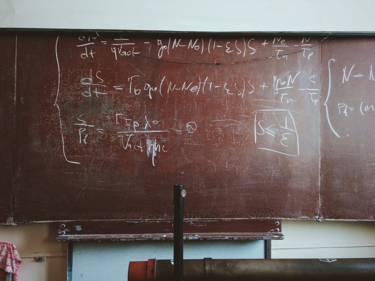 Photo of a math solutions on a blackboard